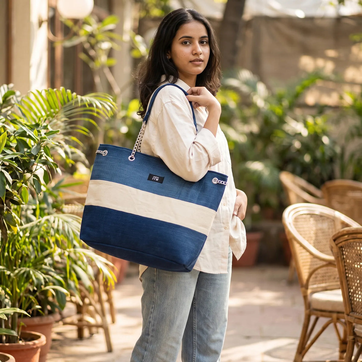 Azure Horizontal tote carried by a model, made from upcycled jeans
