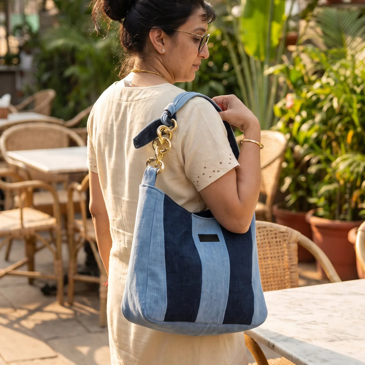 Denim-Delight Rhythm tote carried by a model, made from upcycled jeans
