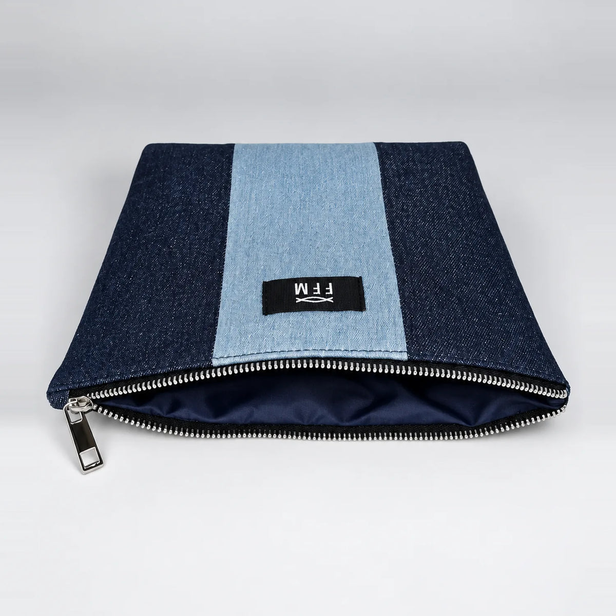 Duo Tassel denim pouch, laid flat