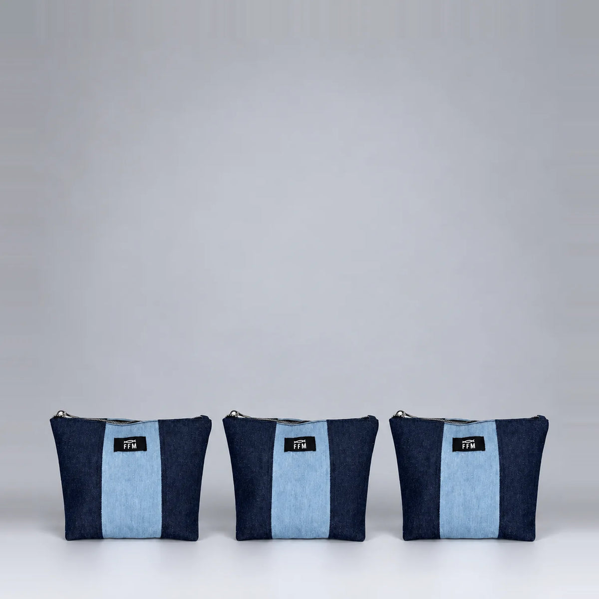 Duo Tassel set of three upcycled denim pouches